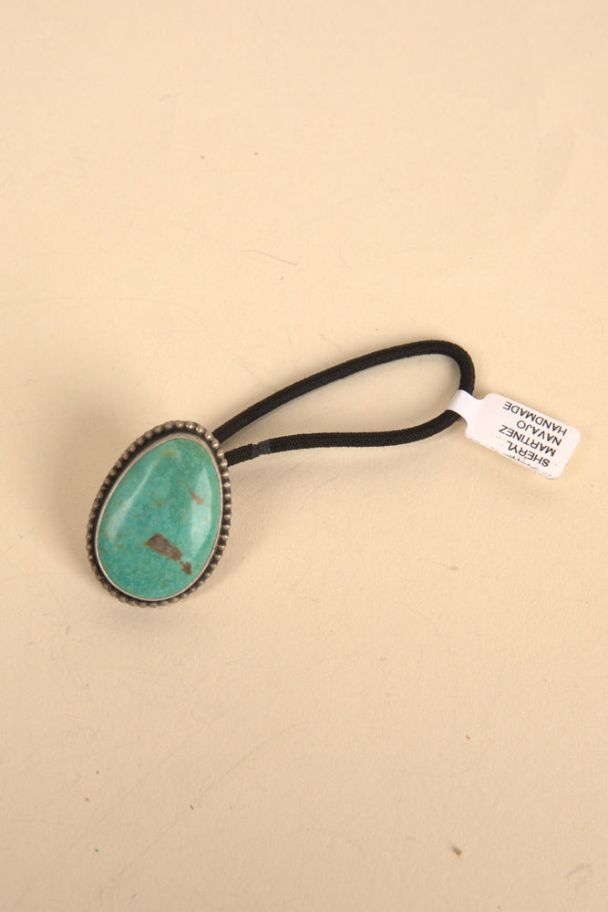 
                  
                    Navajo Handmade Thunder Stone Turquoise Hair Tie
                  
                